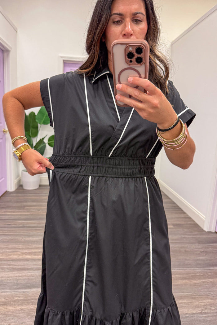 black with white trim short sleeve v neckline smocked waist midi dress