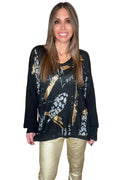 Black waffle knit pullover sweater with allover leopard print, handwritten Wild Love script, and metallic gold brushstroke accents.