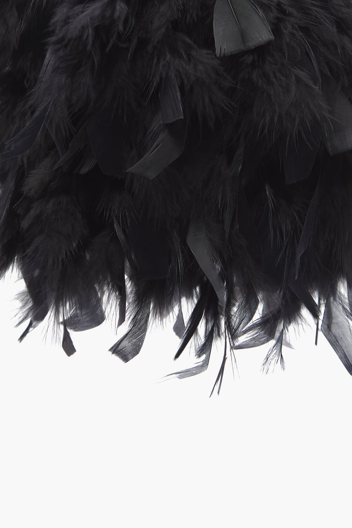 Bolso Bruna Plumas Negro de Lady Pipa para completar looks de invitada.