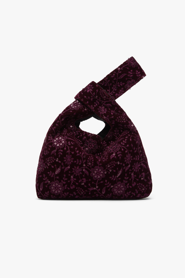Bolso Ópalo Vino de Lady Pipa para completar looks de invitada.