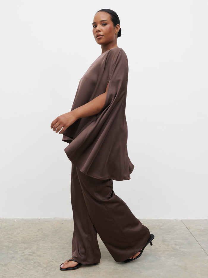 Steffy is 5'7" & Wears Size UK XL-XXL|Breya Cape Floaty Satin Top Curve - Chocolate Brown