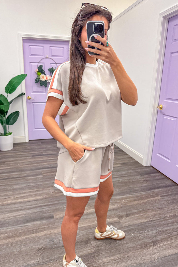 coral and white trimmed short sleeve drop shoulder scuba knit oatmeal top