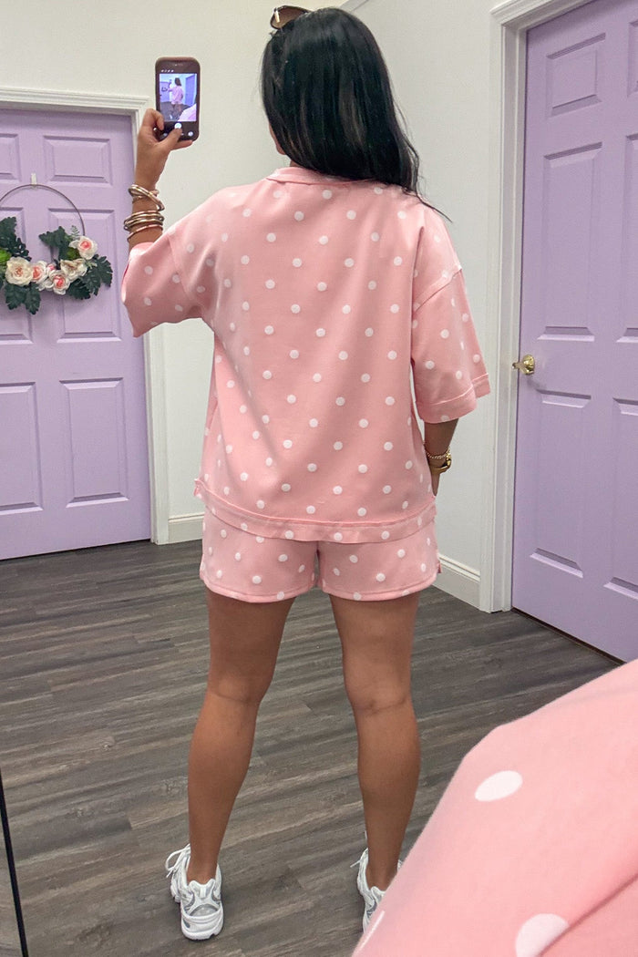 light pink with white polka dot print top and wide leg shorts matching knit loungewear set