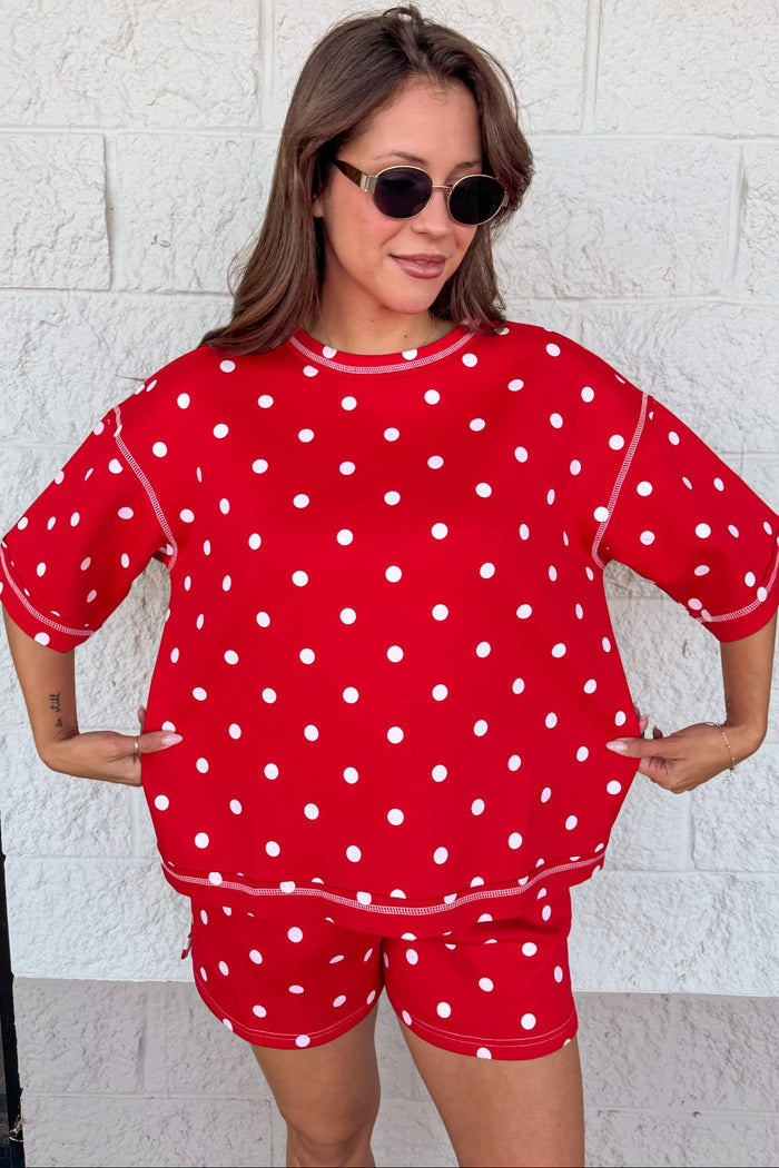 red with white polka dot print relaxed fit top and shorts matching knit athleisure set