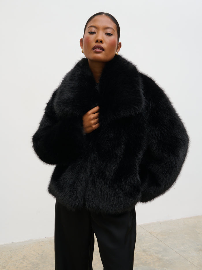 Elle Is 5'3" & Wears Size UK XS|Ettalie Short Faux Fur Coat - Black