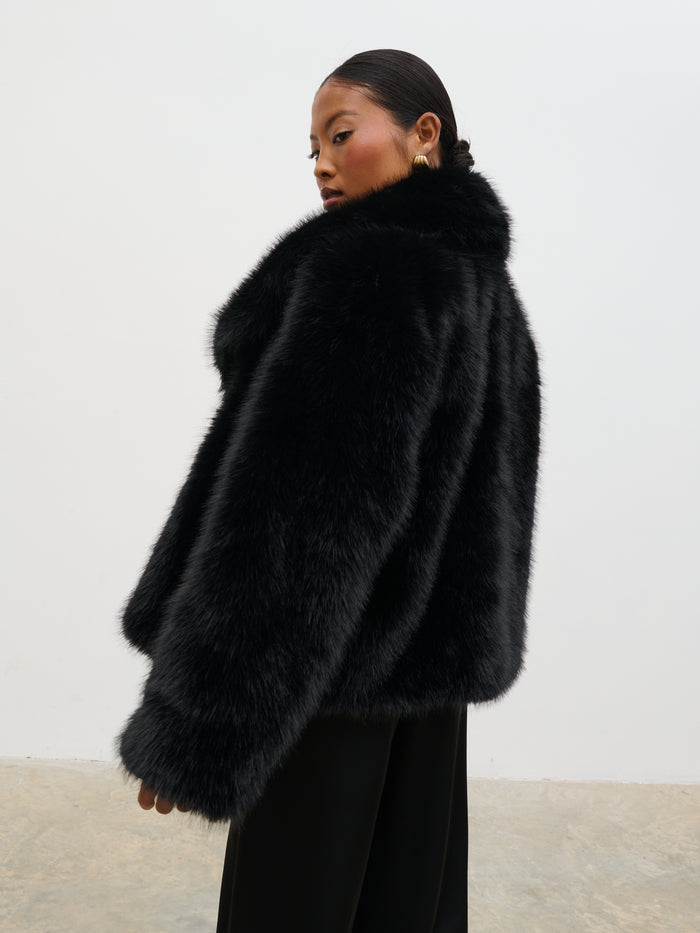 Elle Is 5'3" & Wears Size UK XS|Ettalie Short Faux Fur Coat - Black