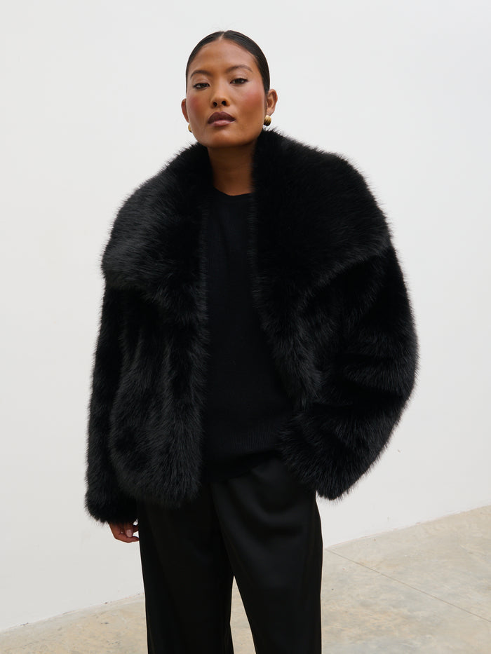 Elle Is 5'3" & Wears Size UK XS|Ettalie Short Faux Fur Coat - Black