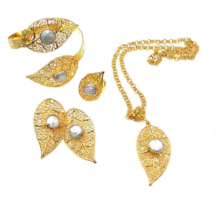 Style the Gold Pearl Brass Set exclusively at Born To Glam