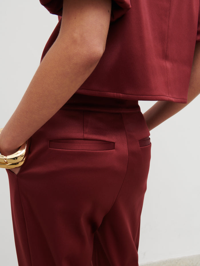 Soni Is 5'9" & Wears Size UK 6|Lorah Wide Leg Bonded Satin Trousers - Wine