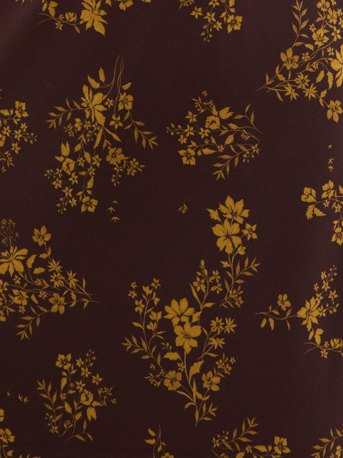 Kavita is 5'7" & Wears Size UK 6|Marlowe Corsage Ruffle Maxi Dress - Brown and Orange Ditsy Floral