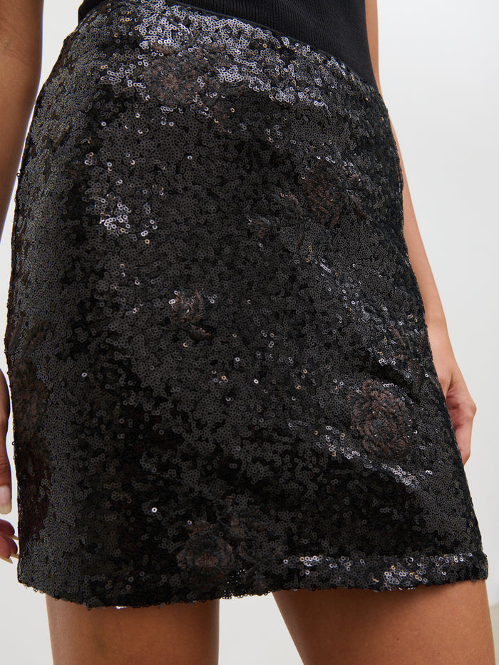 Taina Is 5'8.5" & Wears Size UK 6|Maura Sequin Mini Skirt - Black Floral Sequin