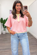 pink and yellow striped with yellow trim details henley button short sleeve top