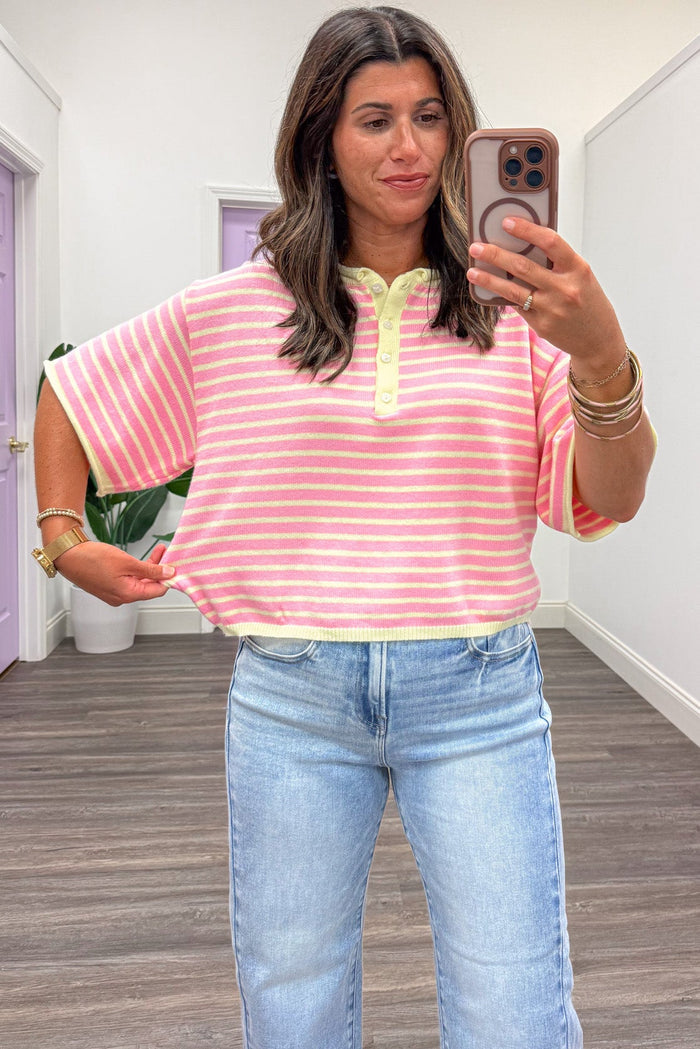 pink and yellow striped with yellow trim details henley button short sleeve relaxed silhouette top