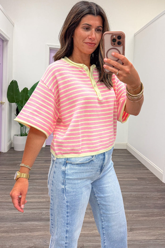 pink and yellow striped with rolled trim details henley button drop shoulder short sleeve top