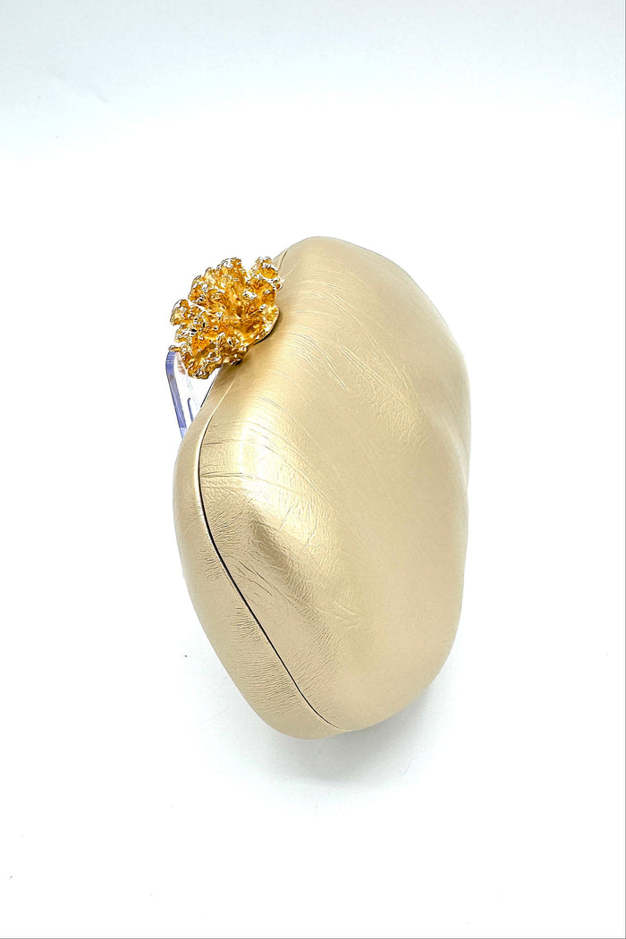 Tres Chic Oval Clutch Champagne Gold